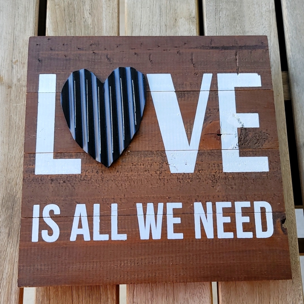 Wood wall art with black metal 3D heart